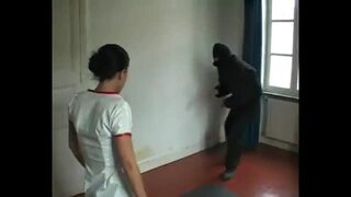 Chinese dominant girl gives a beating to an intruder