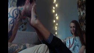 Tattooed sub boyfriend worshiping GF's feet