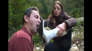 White boots with disgusting mud should be clean with his tongue